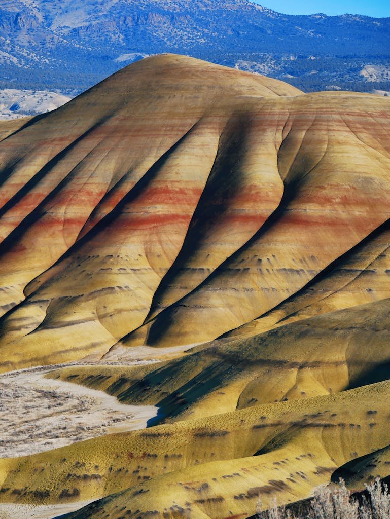 Picturesque view on Painted Hills located in United States and composed of many different colored geological layers